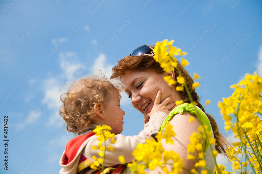 mother and baby on the rape field mother and baby on the rape field