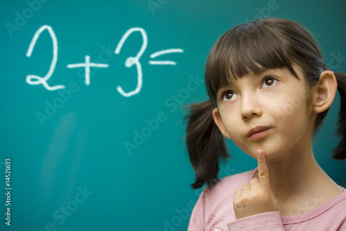 Girl learning math.