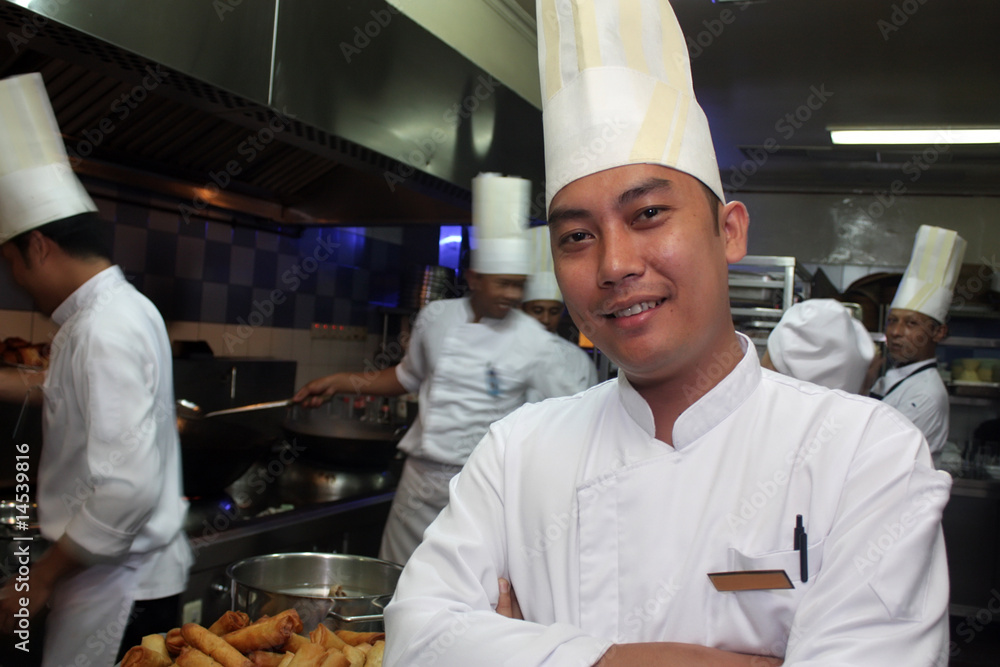 chef posing at work Stock Photo | Adobe Stock