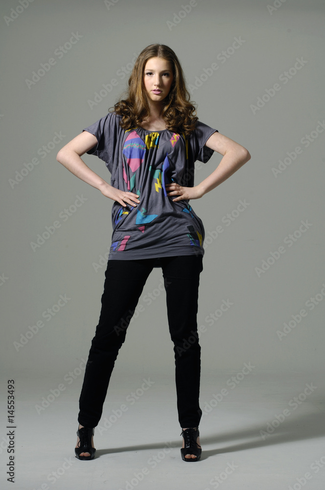 fashion model posing on gray background fashion model posing on gray background