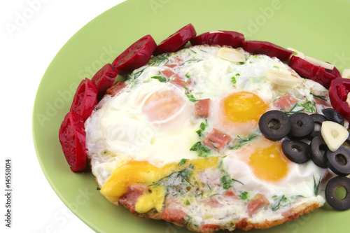 fried eggs and red eggplant