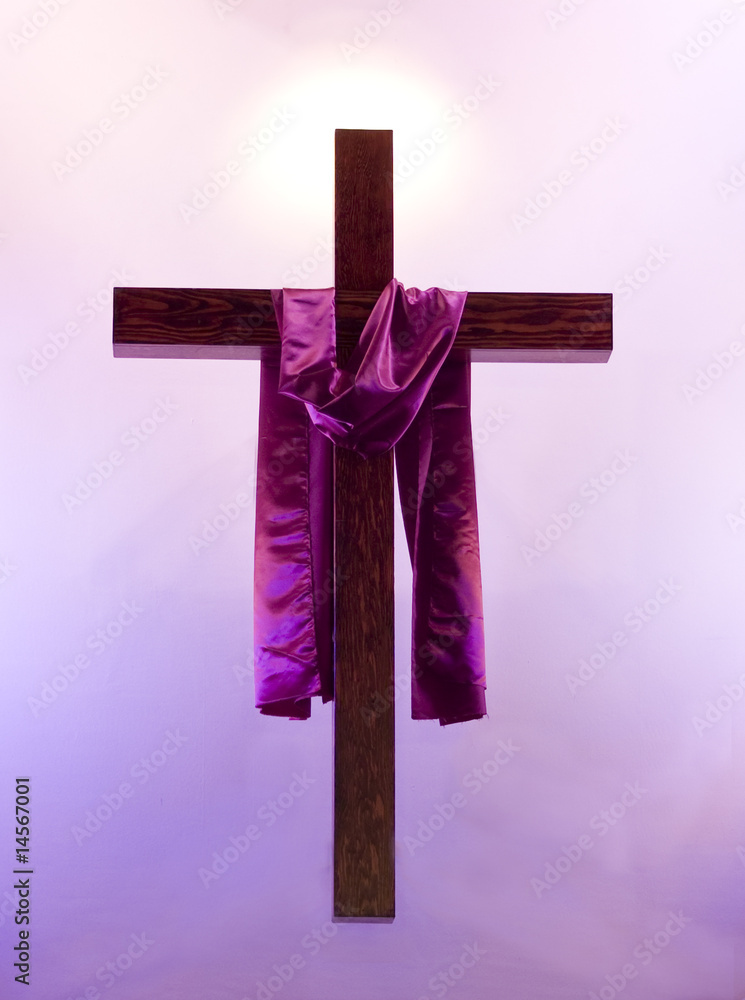 Easter cross with purple sash floating with a glow behind Stock Photo Adobe Stock