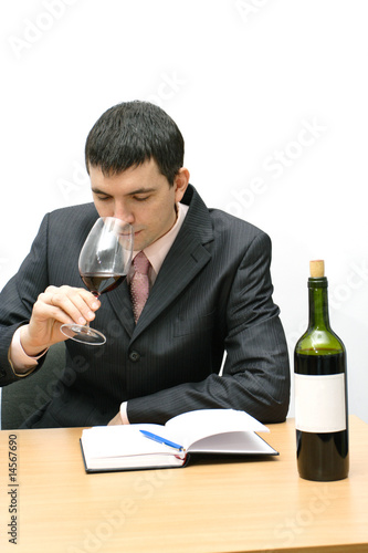 young man testing a wine