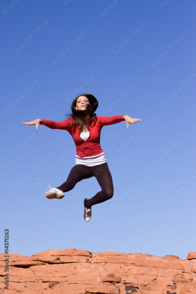 Young athletic woman jumping