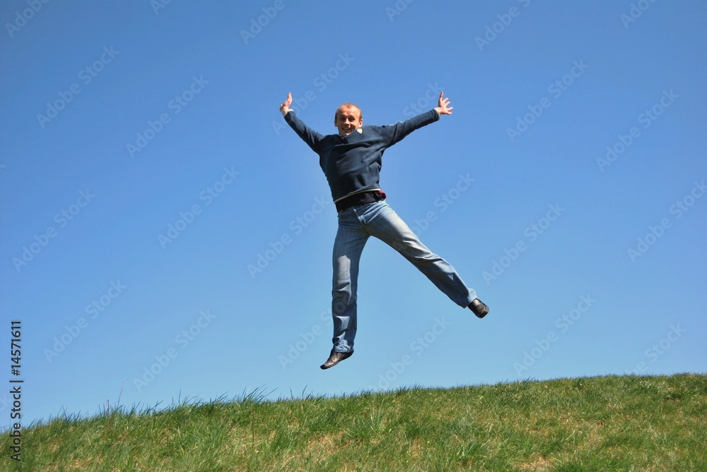 men with skipping on a green meadow men with skipping on a green meadow