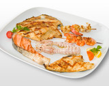 Grilled mixed fish with trout prawn salmon cuttlefish crustacean