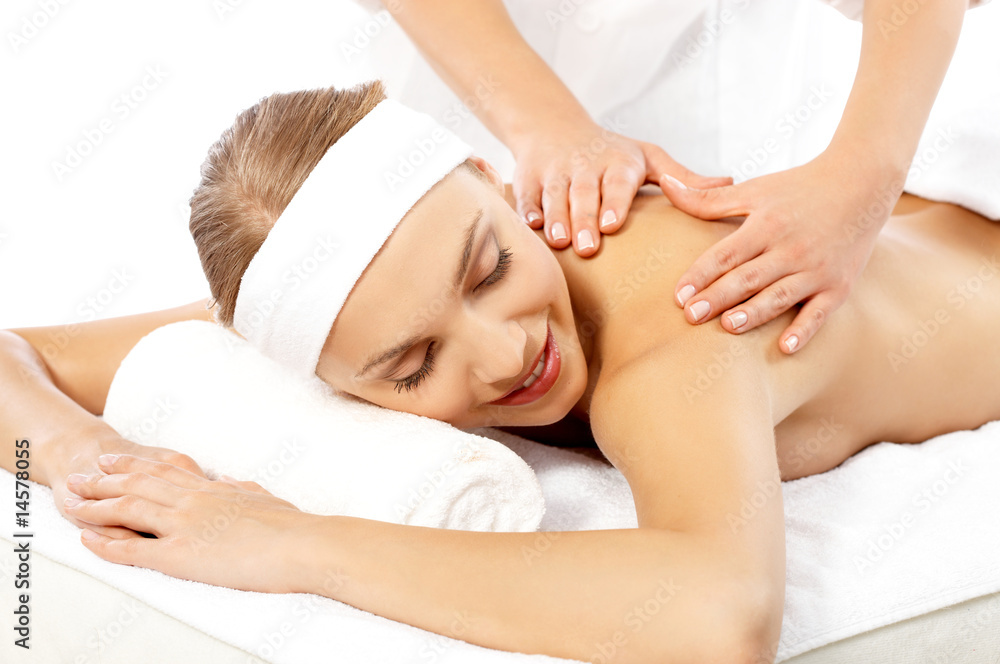 Young beautiful and relaxed lady taking spa treatment