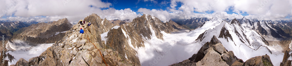 Panorama of Caucasian mountains with climbers at the top - 3