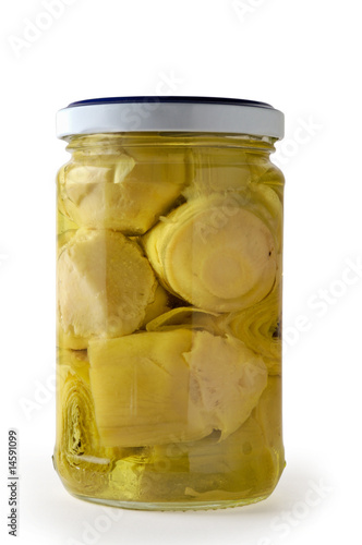 Glass jar of preserved artichokes (vertical closeup)