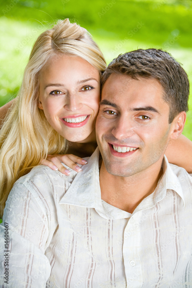 Young attractive happy love couple together, outdoors Young attractive happy love couple together, outdoors
