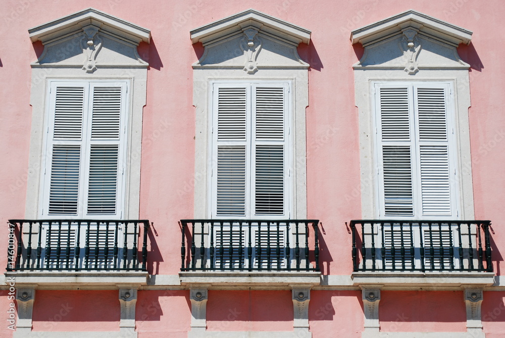 Obraz premium Ancient facade and windows of a typical building