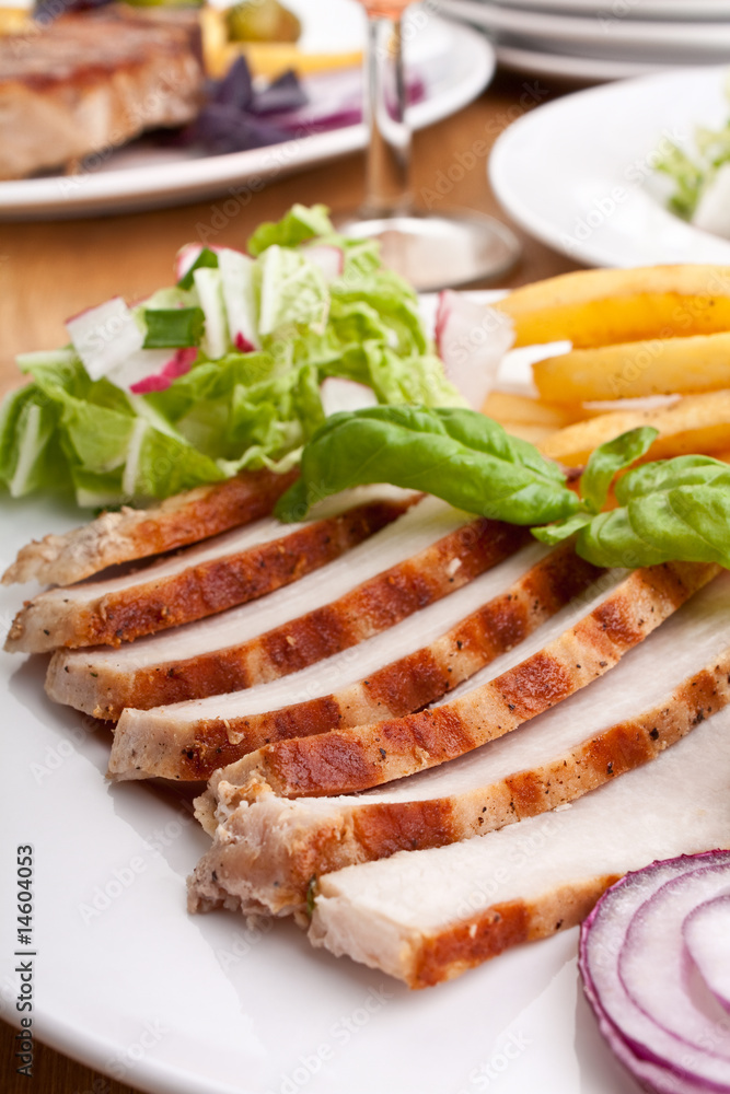 sliced pork chops with french fries