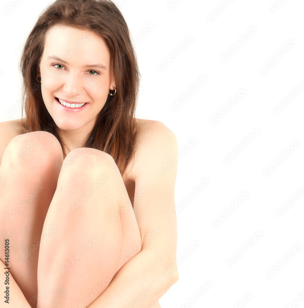 Fototapeta premium Portrait of young nude woman sitting, studio shot