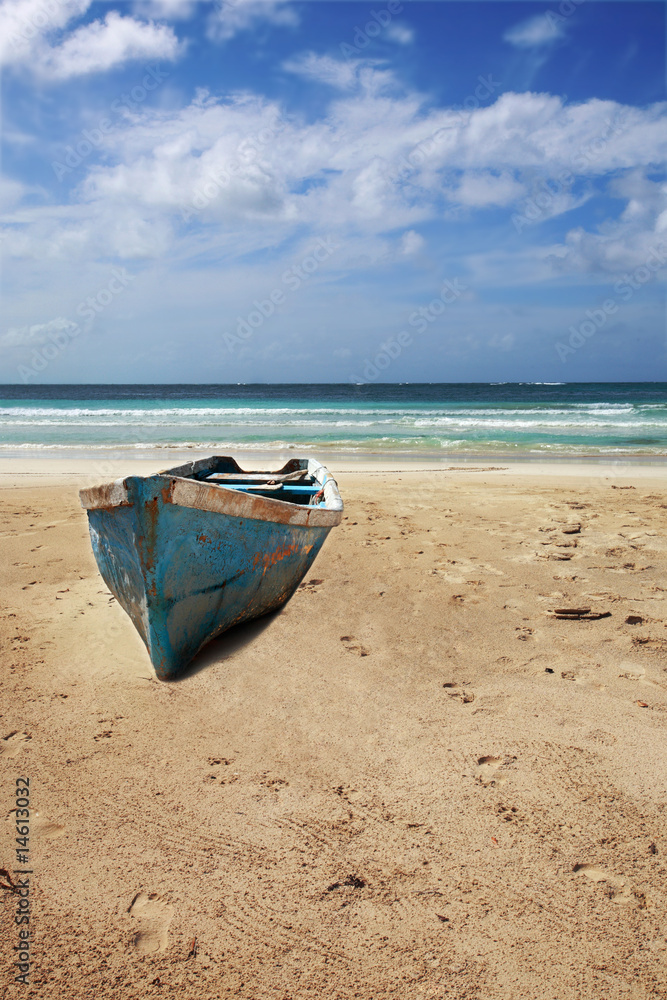 Old boat on beach of Punta Cana, Dominican Republic