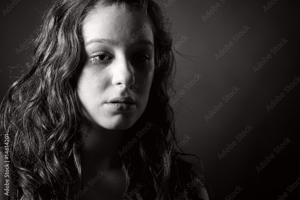 Powerful Black and White Shot of a Tearful Teenager Powerful Black and White Shot of a Tearful Teenager