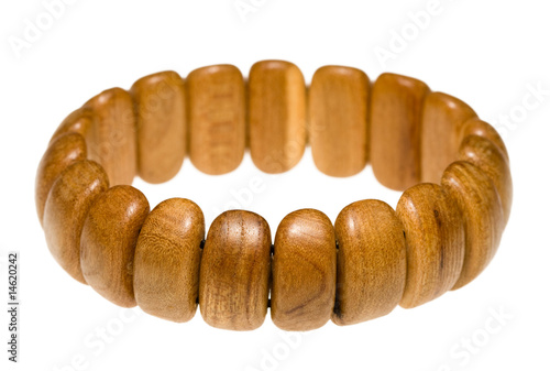 Wooden juniper bracelet over white