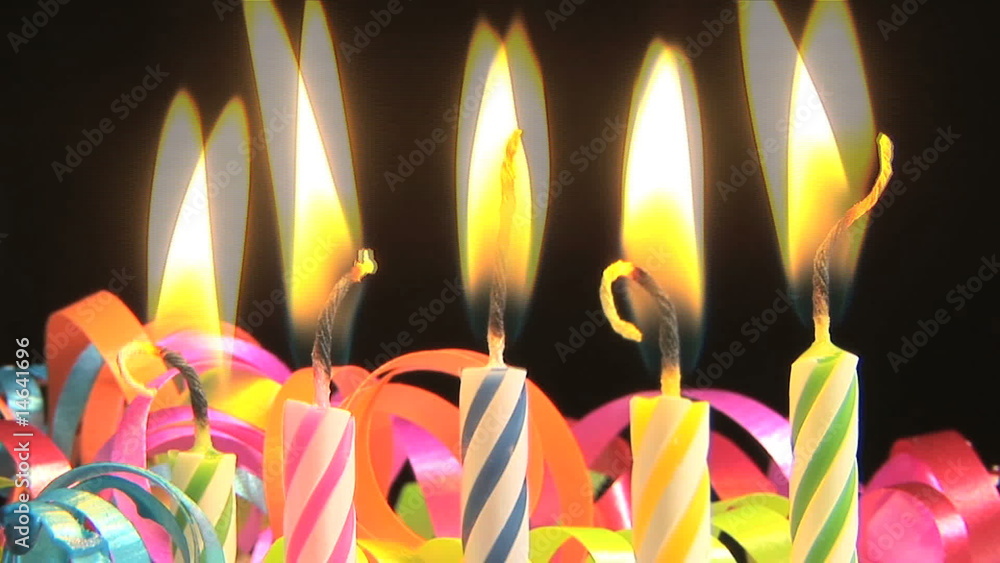 Candles on a Birthday cake burning down, time lapse Candles on a Birthday cake burning down, time lapse