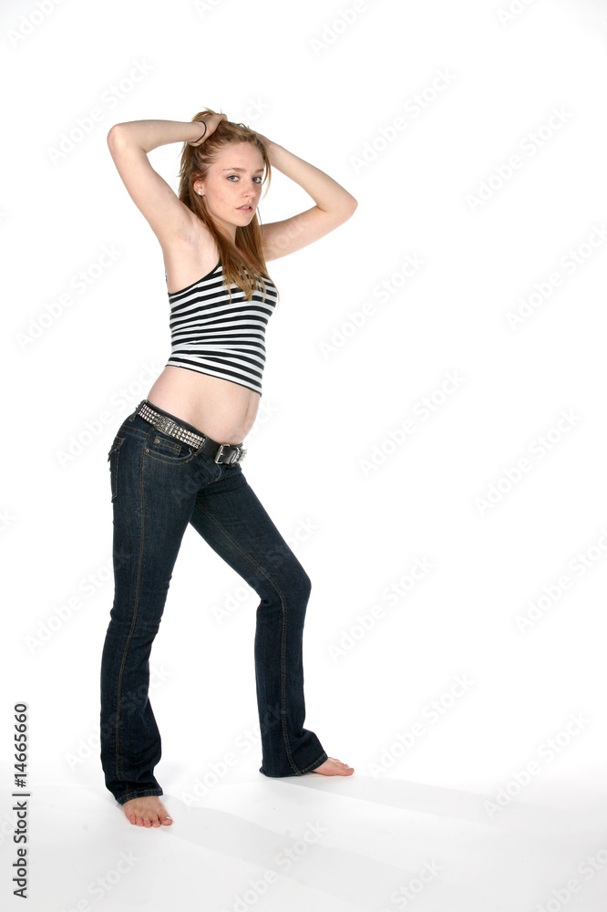 woman in low jeans showing her bare belly Stock Photo | Adobe Stock