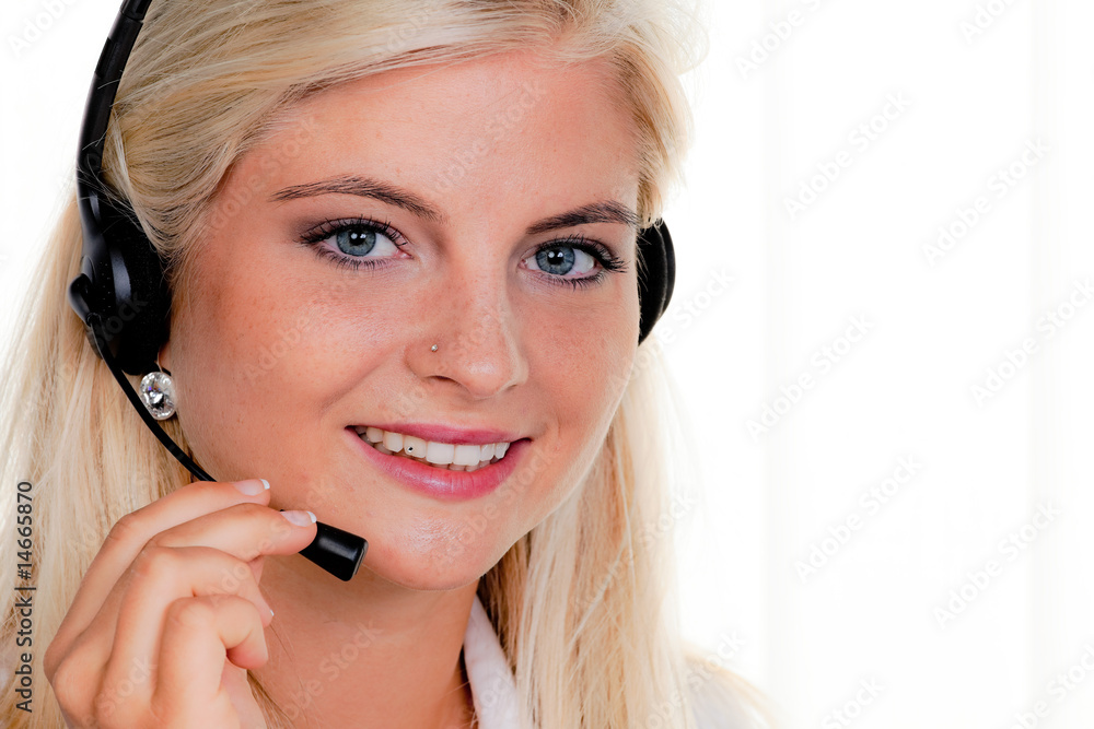 Frau mit Headset Telefon im Call Center