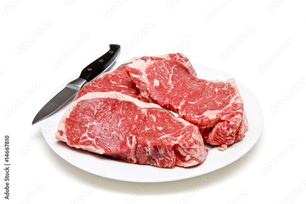 Plate of Steaks and Knife