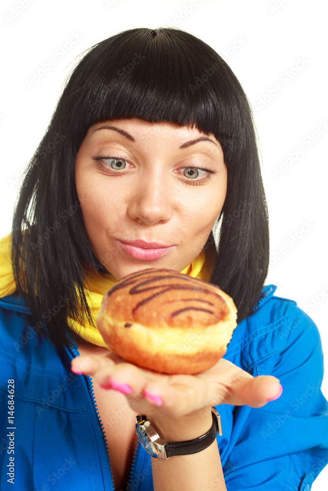 girl eating a roll with chocolate girl eating a roll with chocolate