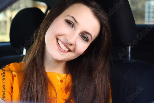 a young woman with her car © Jane Doe