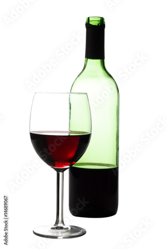 A glass of red wine and a bottle