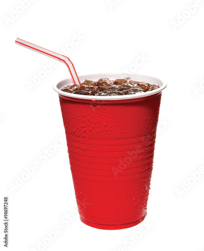 red plastic cup of soda with straw