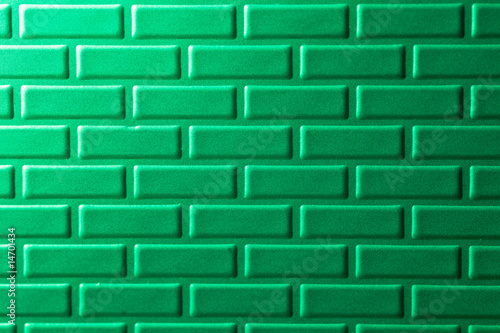 Wall of metallic bricks