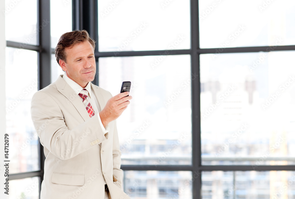 Senior businessman texting with copy-space Senior businessman texting with copy-space