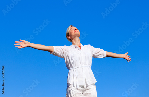 Happy woman with open arms