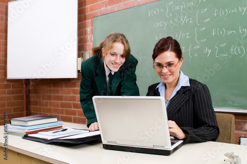 Obraz na plátně teacher guiding student