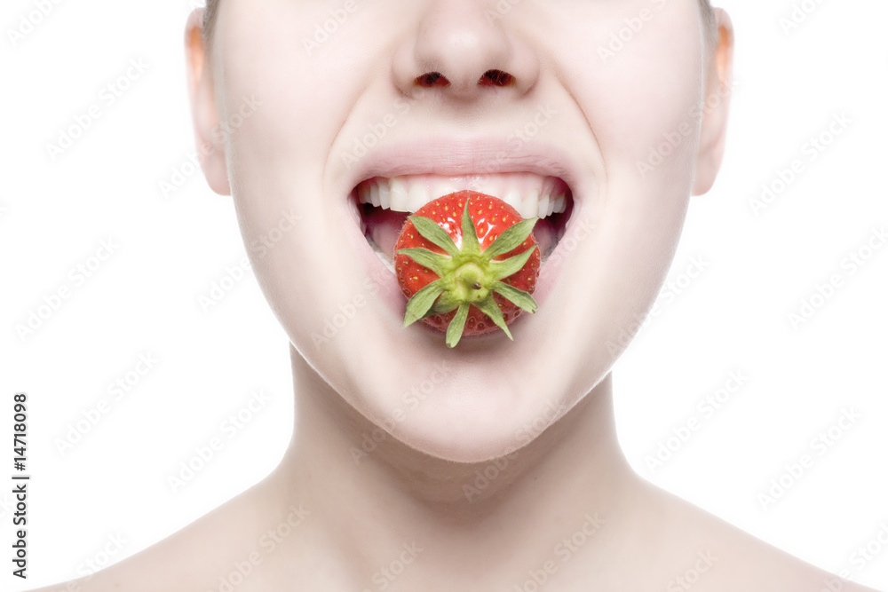 beautiful girl eating a strawberry