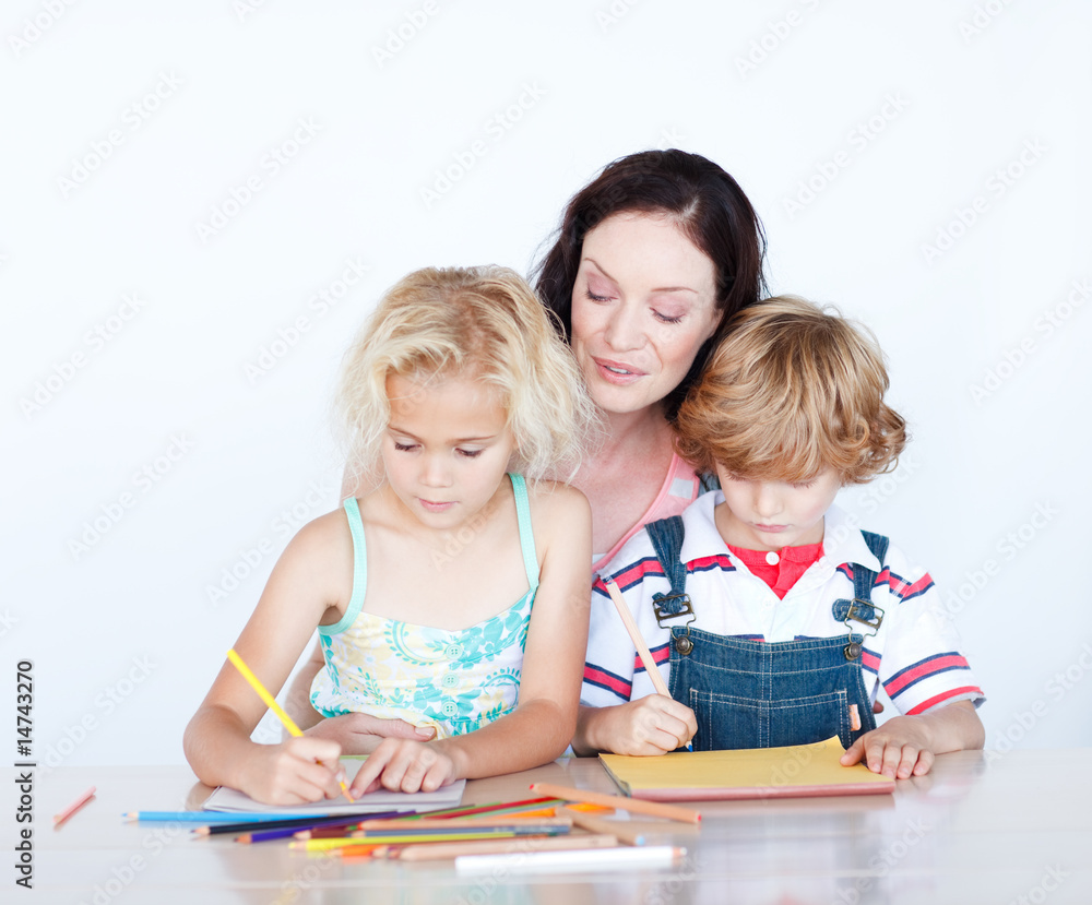 Mother and children writing together Mother and children writing together