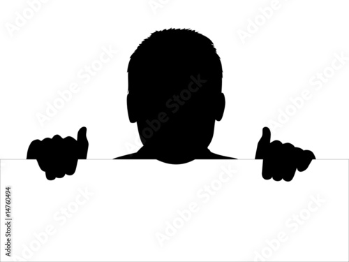 Young man behind a board