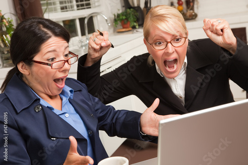 Fotografija Excited Businesswomen Celebrate Success on Laptop