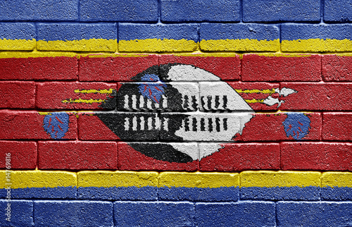 Flag of Swaziland on brick wall © Carsten Reisinger
