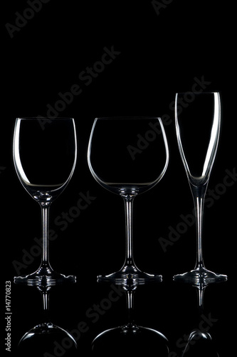 three glasses isolated on black background