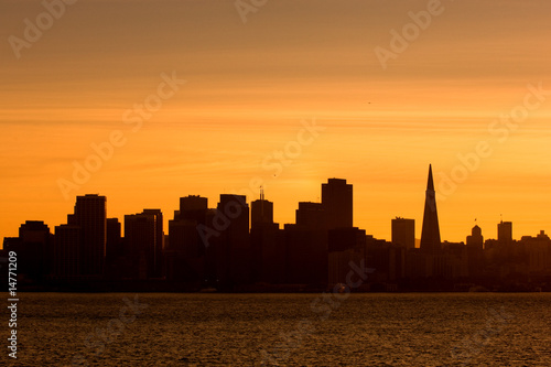 Silhouette of downtown San Francisco at sunset © Natalia Bratslavsky