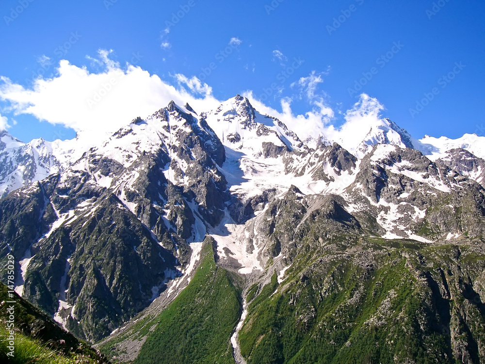 High mountains with snow in summer