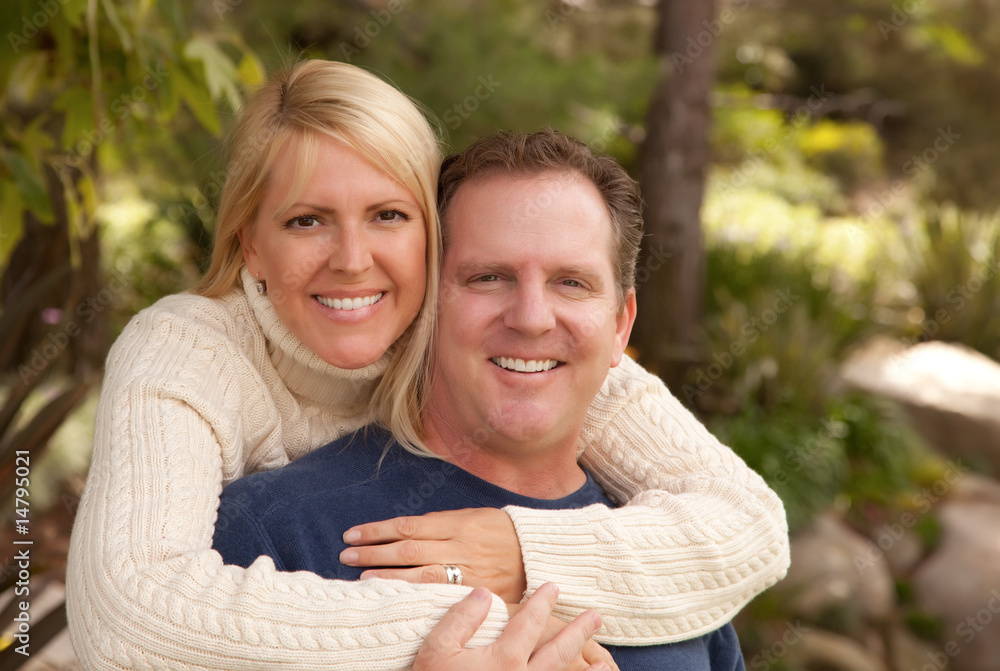 Naklejka premium Happy Attractive Couple in the Park