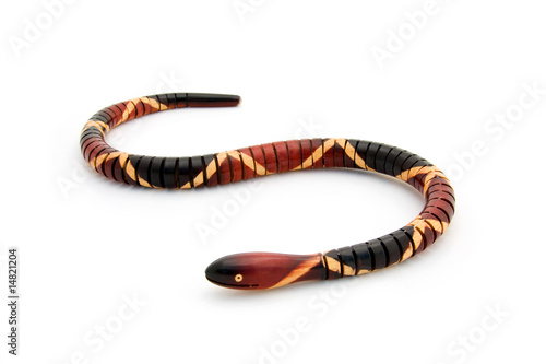 wooden snake isolated on white background