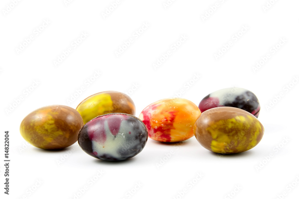 colorful chocolate eggs isolated on white background colorful chocolate eggs isolated on white background