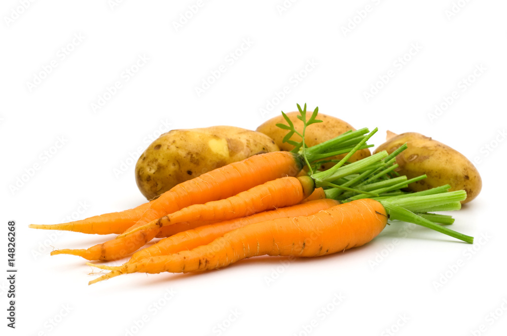 young potatoes and carrots on white background young potatoes and carrots on white background