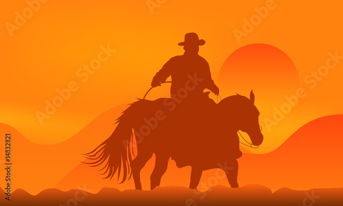 Cowboy over sunset