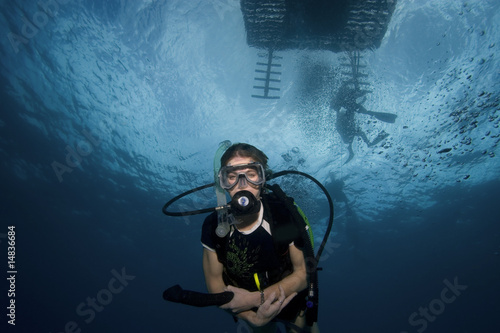 Woman scuba diving, Key Largo, Florida