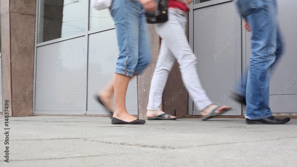 Feet of people passing by Feet of people passing by