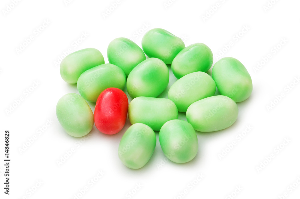Stand out from crowd concept with jelly beans Stand out from crowd concept with jelly beans
