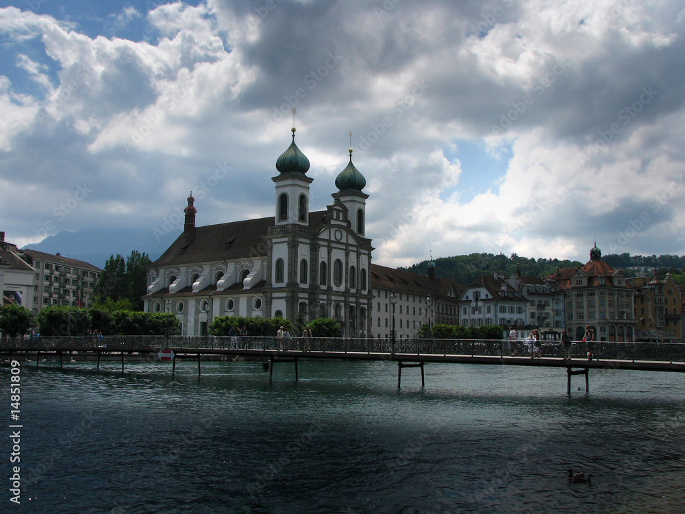 Fototapeta premium scenic lights over the church along the river