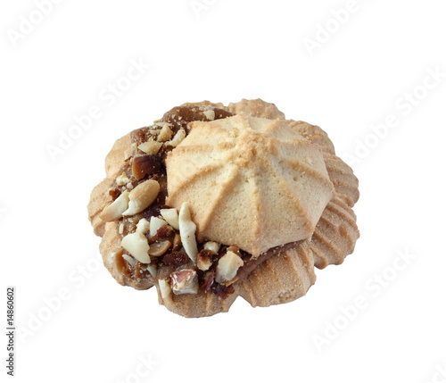 Shortbread with cream and peanut on a white background